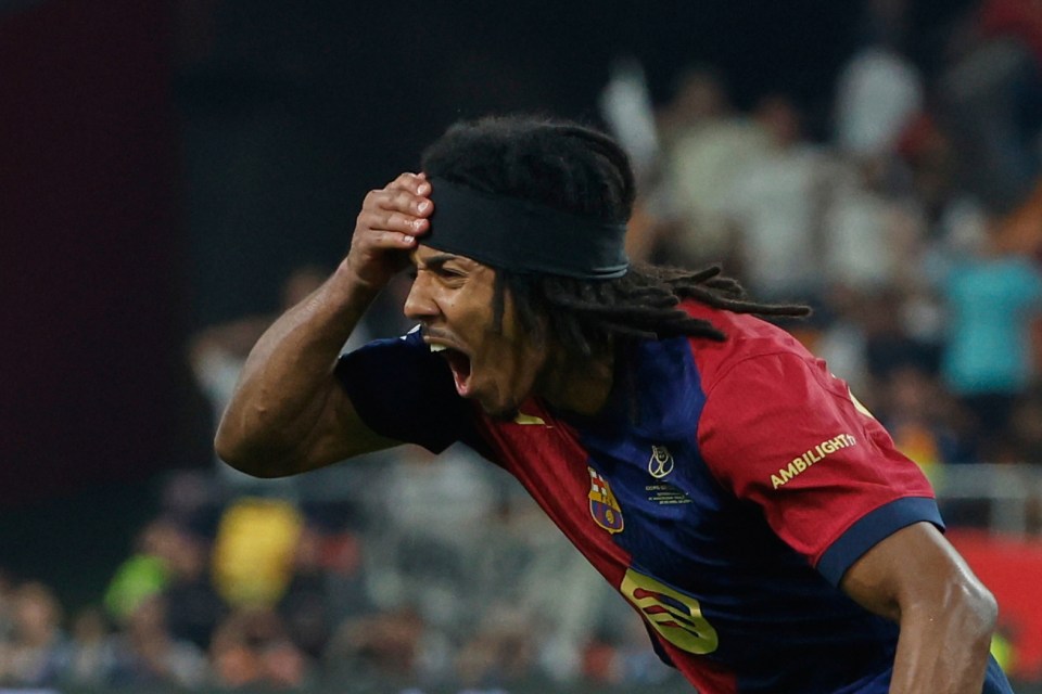 Jules Kounde of FC Barcelona celebrates scoring a goal.