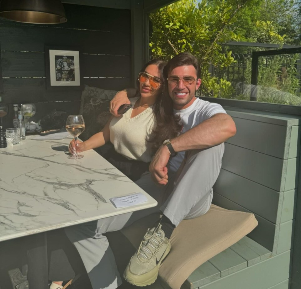 Chloe Brockett and Jack Fincham at an outdoor restaurant.