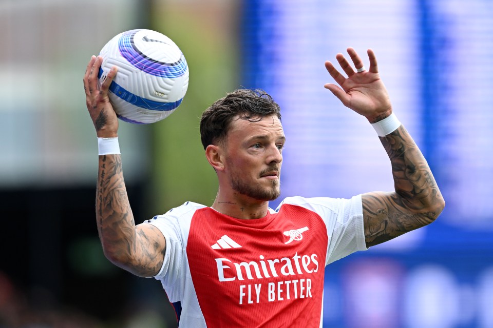 Ben White of Arsenal taking a throw-in during a soccer match.