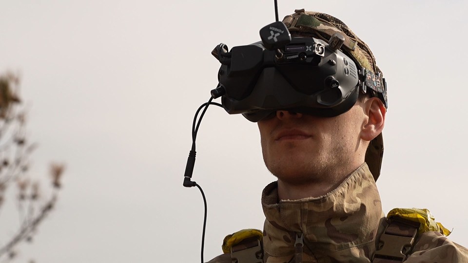A soldier wearing a virtual reality headset.