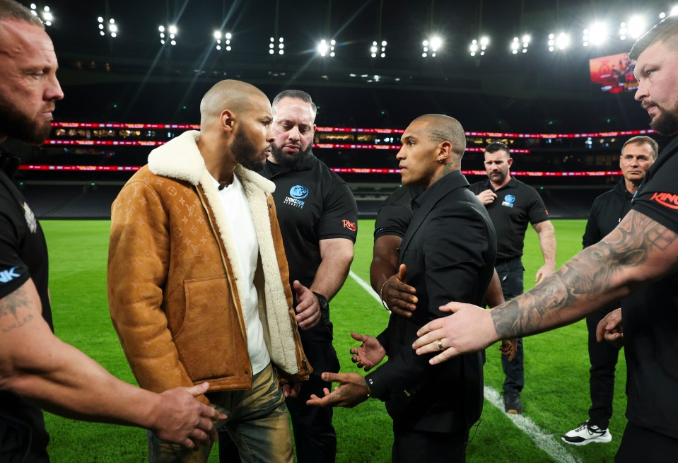 Chris Eubank Jr. and Conor Benn face off at a press conference.