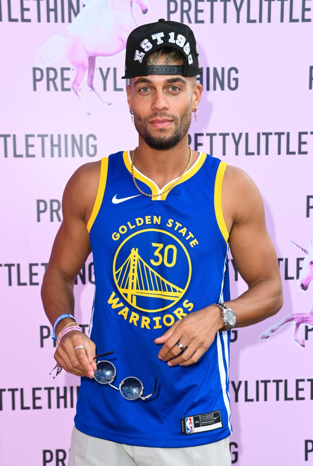 Ouzy See at We Are FSTVL wearing a Golden State Warriors jersey.