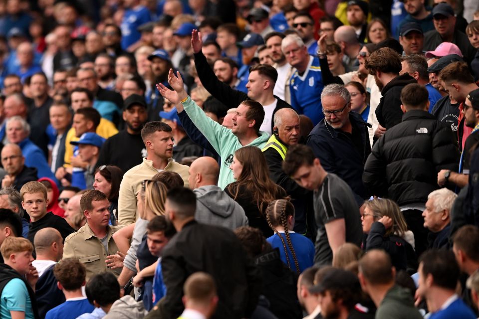 Cardiff City fans at a football match.