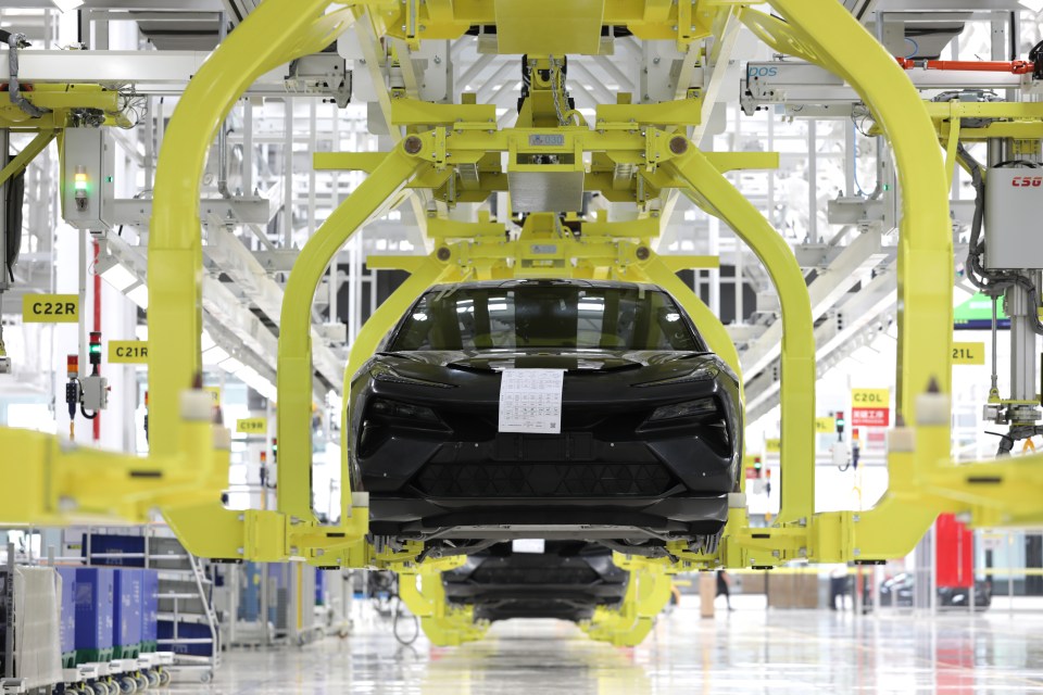 Electric SUV on assembly line.
