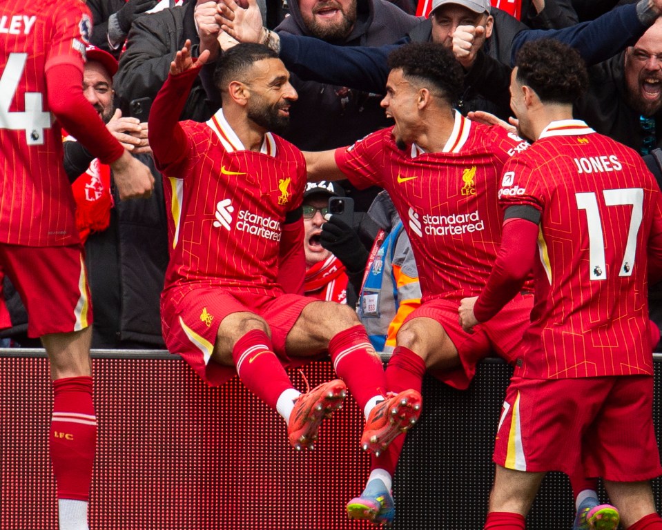 Liverpool's Mohamed Salah and Luis Diaz celebrating a goal.