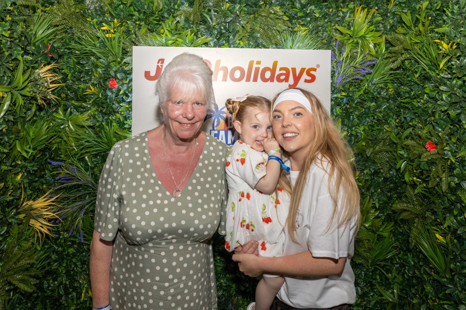 Francesca, her mother Kim Averill, and daughter Georgia posing for a photo.