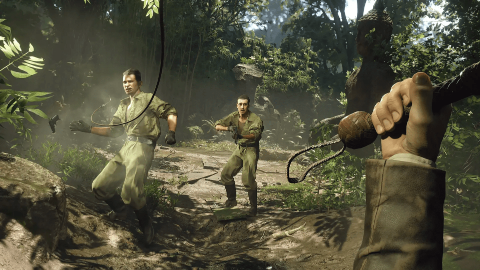 Screenshot of a jungle video game scene showing two men in khaki uniforms being pursued.