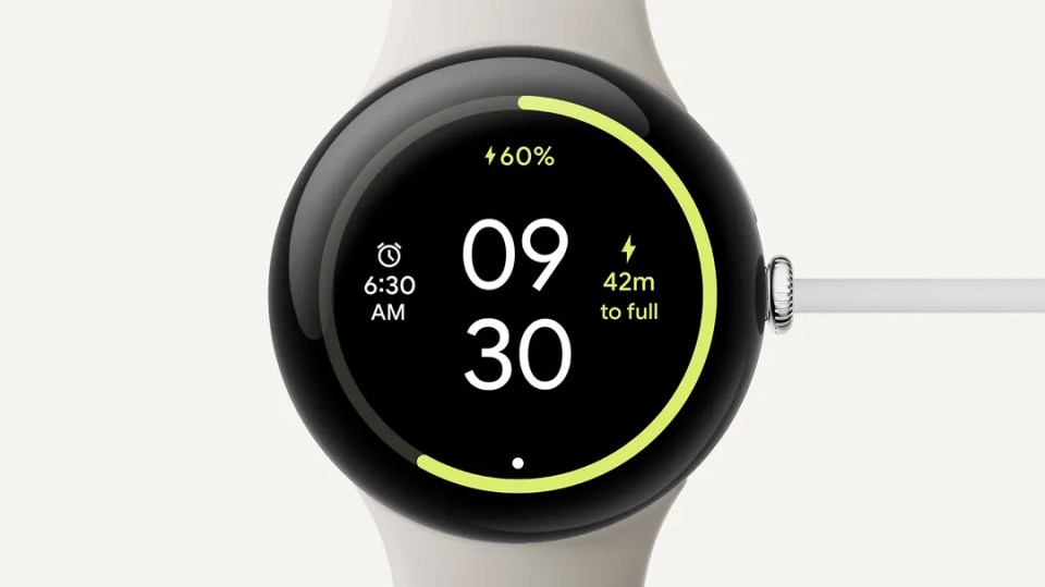 Google smartwatch charging, showing 60% battery and 42 minutes to full charge.