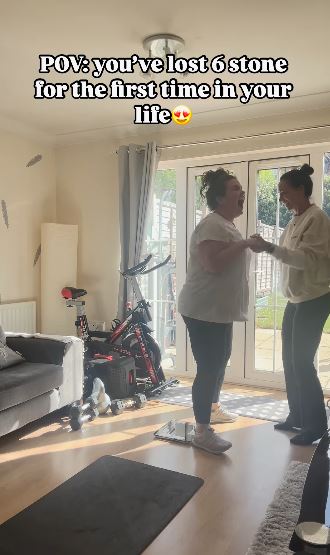 Two women celebrating a six-stone weight loss.