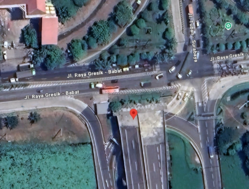 Aerial view of a car crash site on an unfinished bridge in East Java, Indonesia.