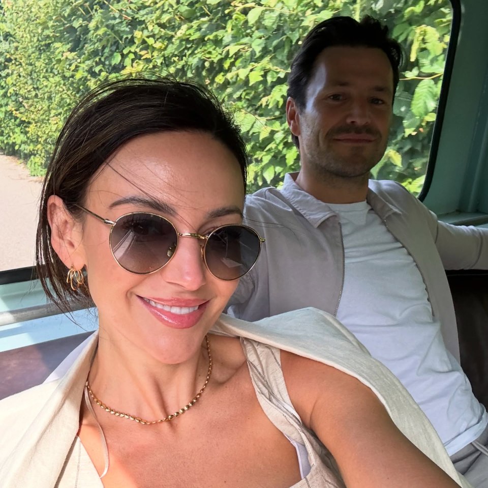 Michelle Keegan and Mark Wright in a vehicle.