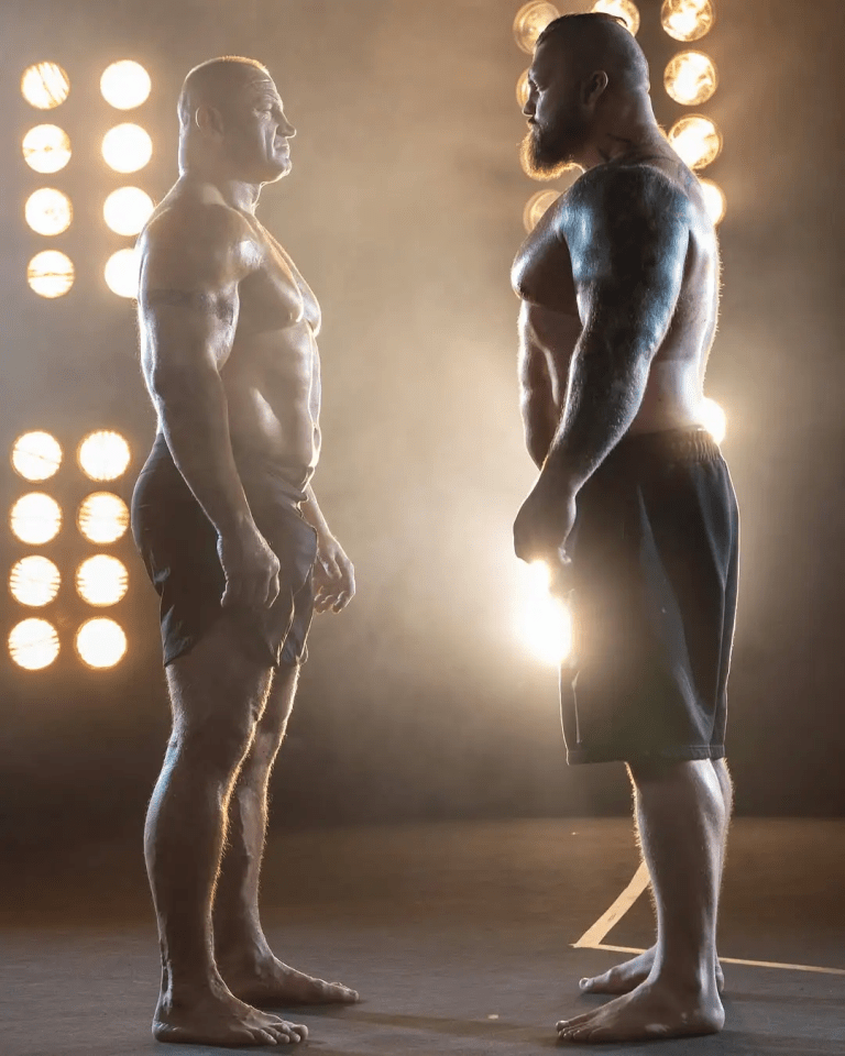 Two muscular men facing each other.