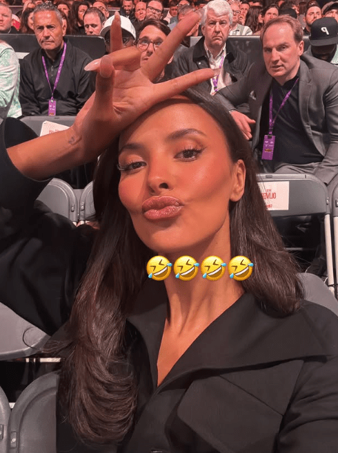 Selfie of Maya making a funny face in a crowd.