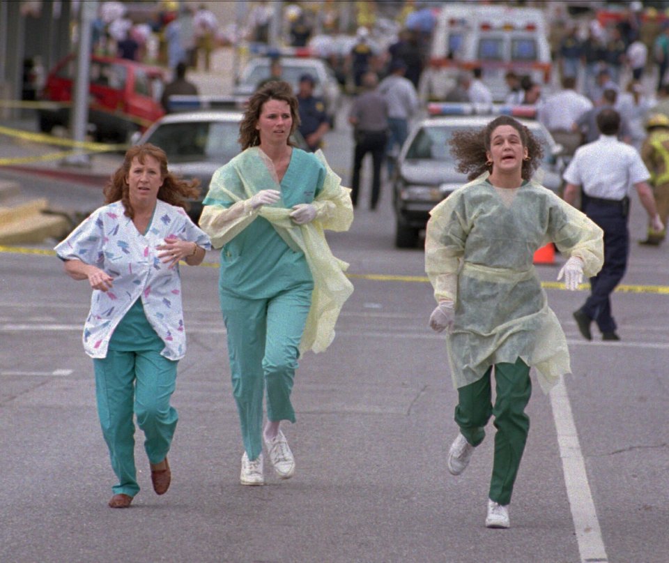 Medical assistants fleeing the Alfred P. Murrah Federal Building after a bomb threat.