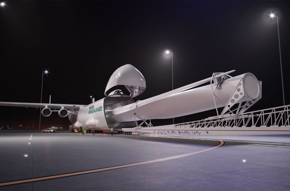 Illustration of a large cargo plane loading a wind turbine blade at night.