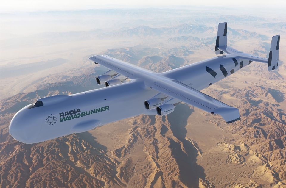 Illustration of the Radia Windrunner, a large cargo plane, flying over a mountainous desert.