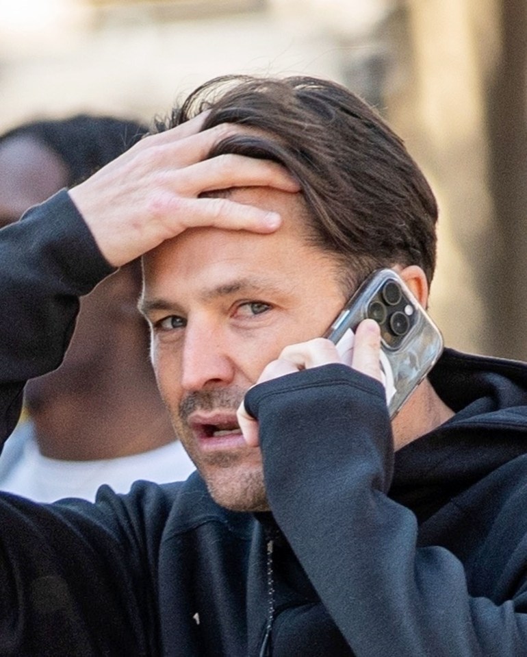 Mark Wright on a phone call.