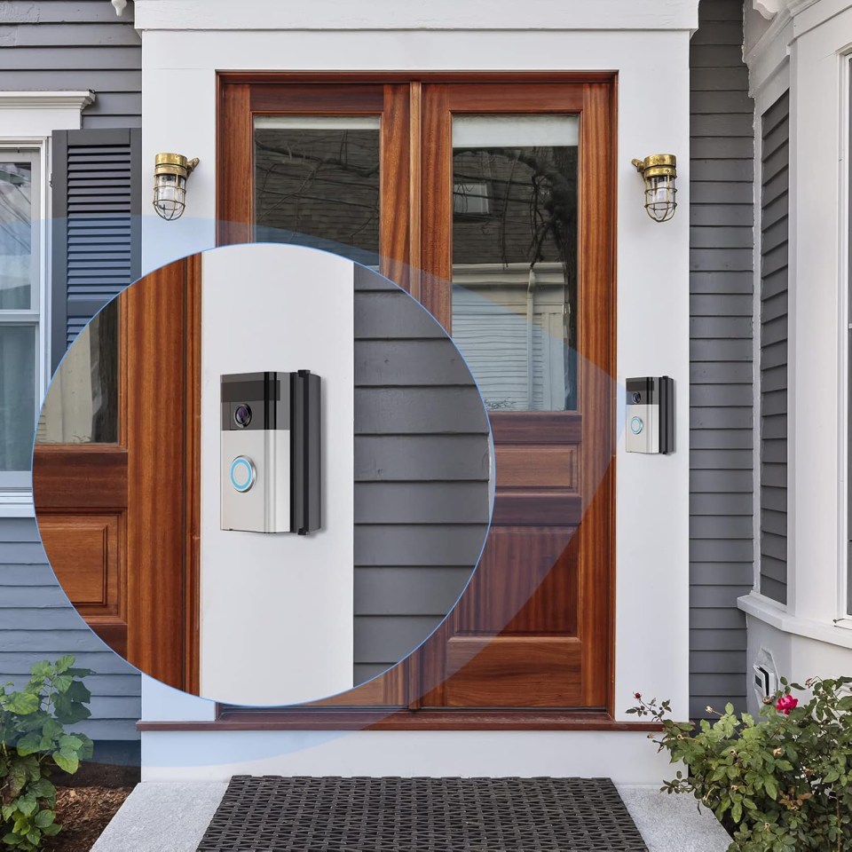 Smart doorbell installed on house exterior.
