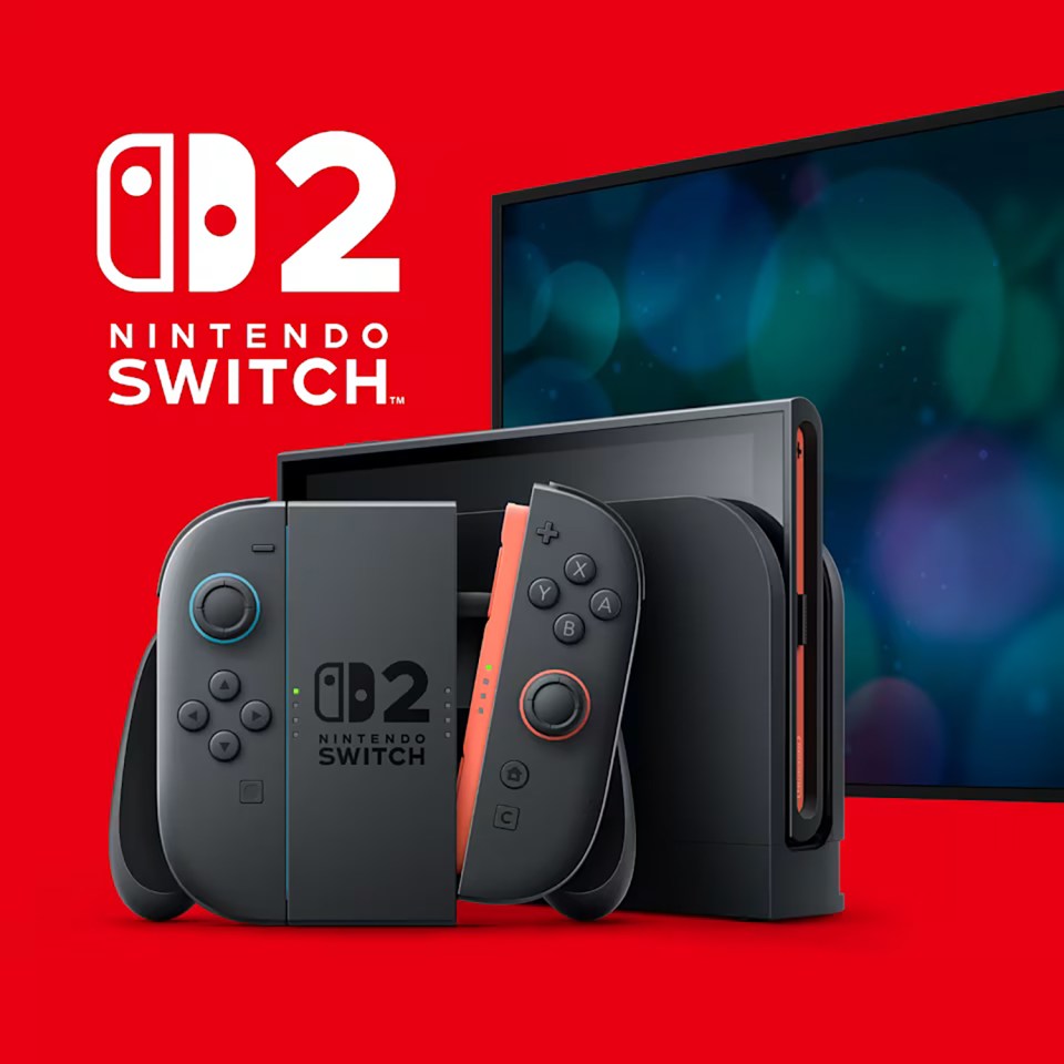 Nintendo Switch OLED model with controllers and dock.