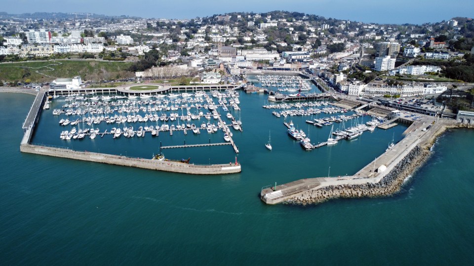 Aerial view of Torquay harbor and town center.