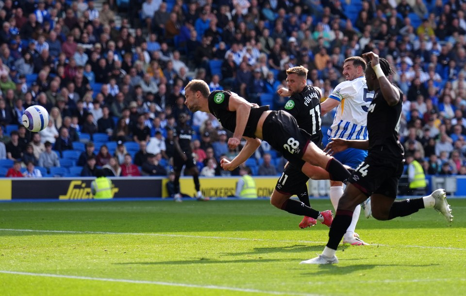 Tomas Soucek scoring a goal during a soccer match.