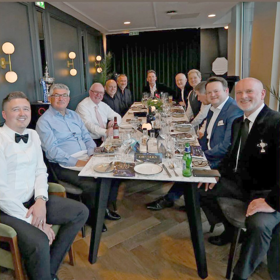 WPBSA Player Championship dinner attendees seated at a long table.
