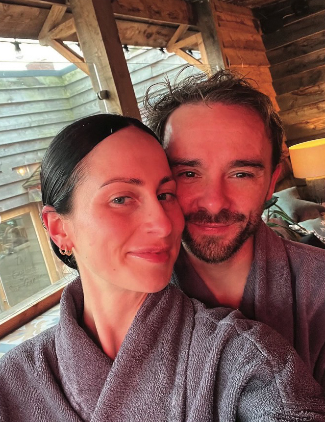 Couple in bathrobes at a spa.
