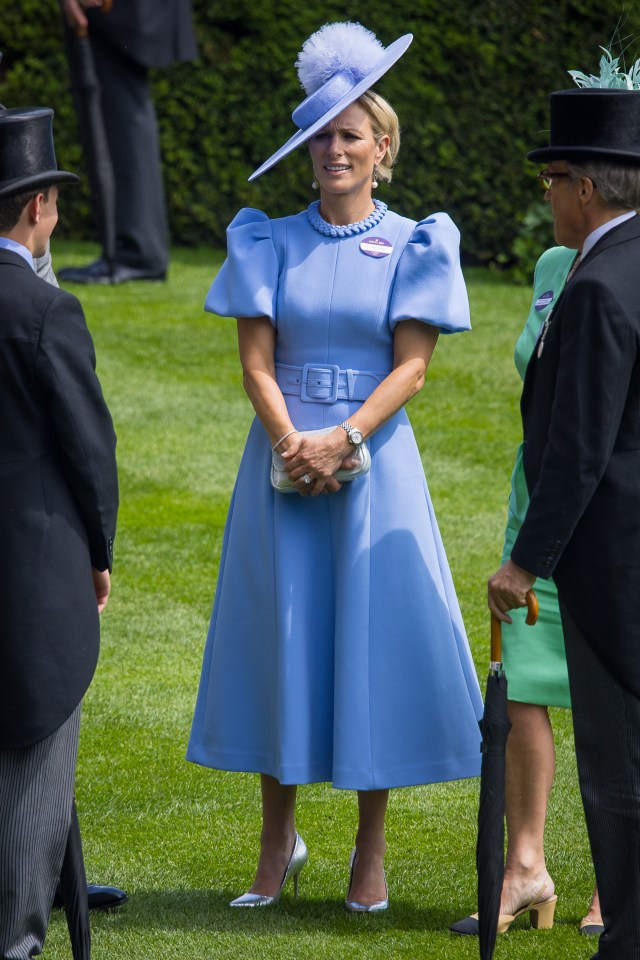 Zara Tindall in a light blue dress and hat at Royal Ascot.