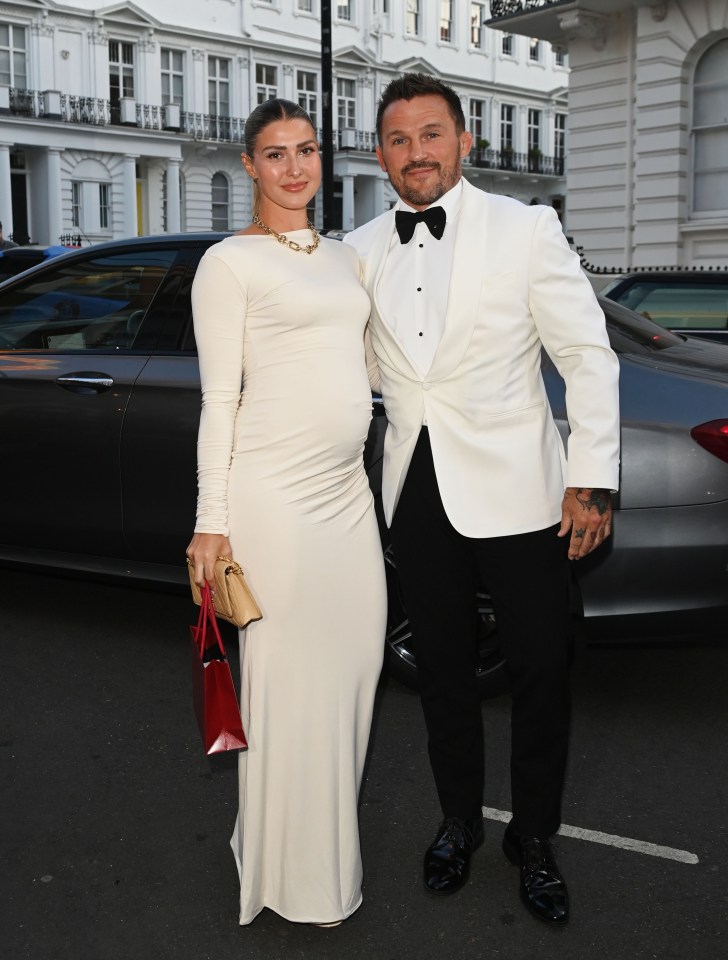 David Beckham and a guest at his 50th birthday dinner.