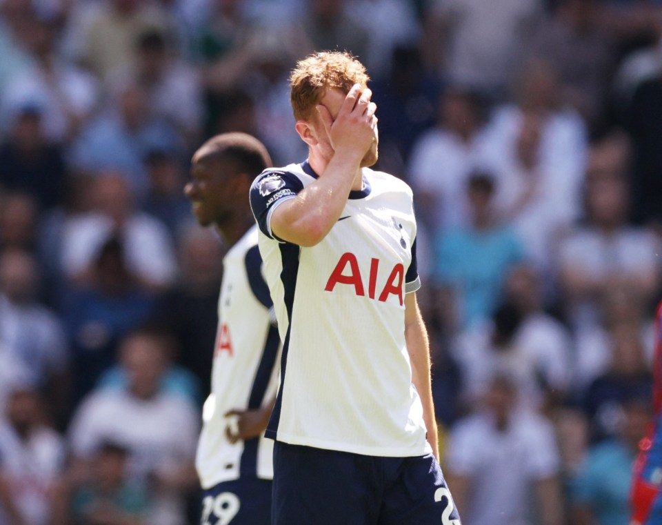 Dejan Kulusevski of Tottenham Hotspur looking dejected during a soccer match.
