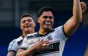 Two Hull FC rugby players celebrating a win.