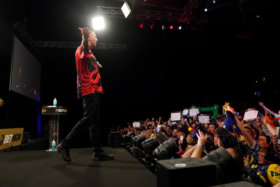 Nathan Aspinall gestures to the crowd ahead of his match against Chris Dobey (not pictured) on night fifteen of the BetMGM Premier League at P&J Live, Aberdeen. Picture date: Thursday May 15, 2025. PA Photo. See PA story DARTS Aberdeen. Photo credit should read: Andrew Milligan/PA Wire. RESTRICTIONS: Use subject to restrictions. Editorial use only, no commercial use without prior consent from rights holder.