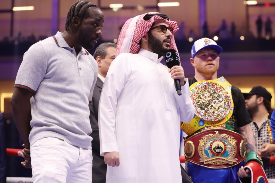 RIYADH, SAUDI ARABIA - MAY 03: Terence Crawford, Turki Al-Sheikh and Saul "Canelo" Alvarez (L-R) after the super middleweight fight on the Fatal Fury City of Wolves card at ANB Arena on May 03, 2025 in Riyadh, Saudi Arabia. (Photo by Richard Pelham/Getty Images)