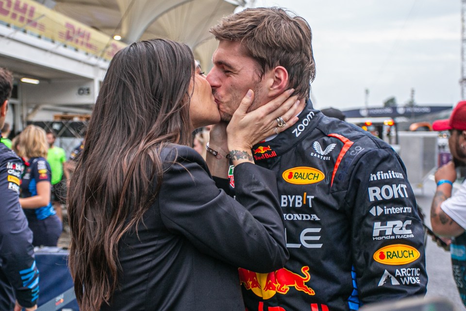 Max Verstappen kissing Kelly Piquet after a race win.
