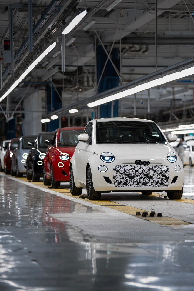 New Fiat 500 Hybrid cars on an assembly line.