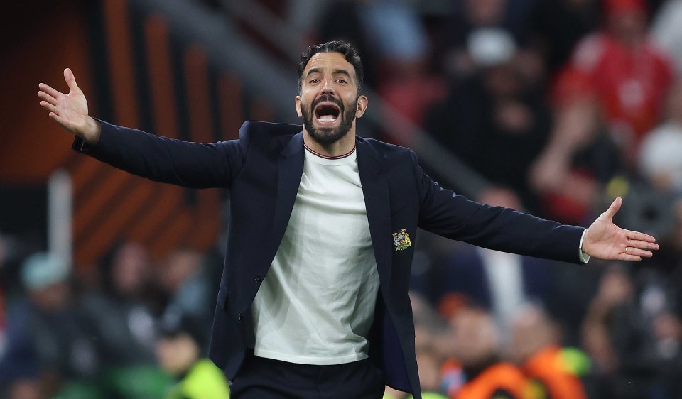 Frustrated soccer manager with arms outstretched.