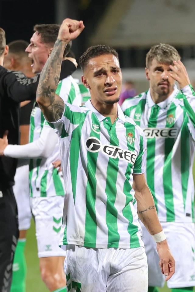 Soccer player celebrating, crying.