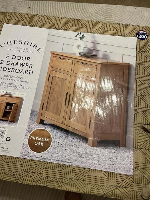 Two-door, two-drawer sideboard in premium oak.