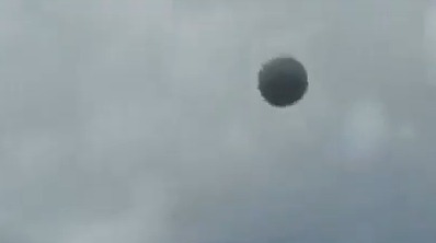 Sphere-shaped UFO in the sky.
