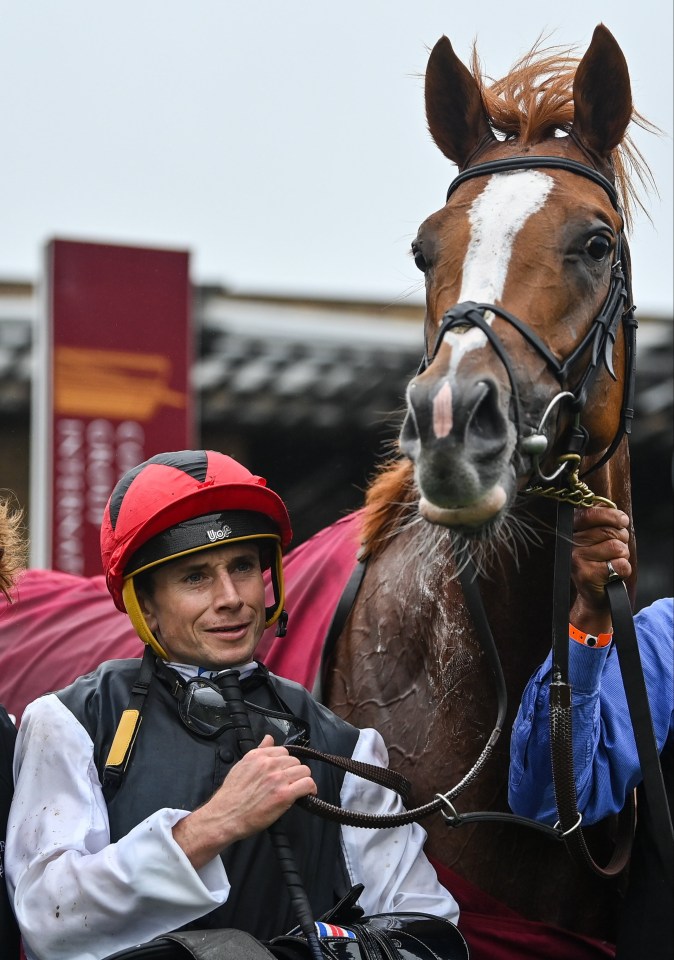 Jockey Ryan Moore and winning horse Kyprios.