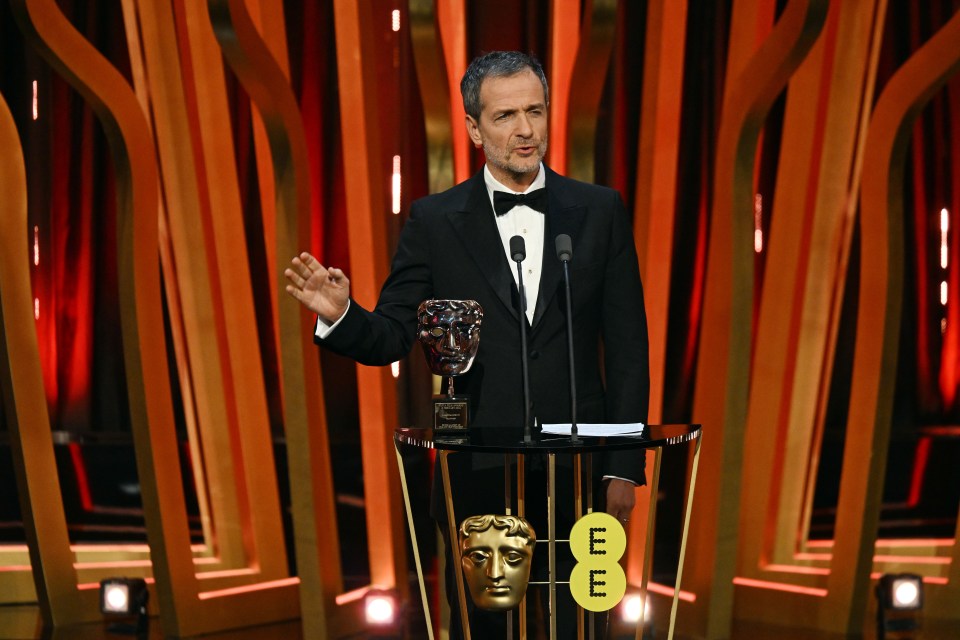 David Heyman presenting a BAFTA Fellowship Award.