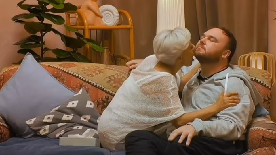 Dr. Danielle Harel and Zac embracing on a couch.