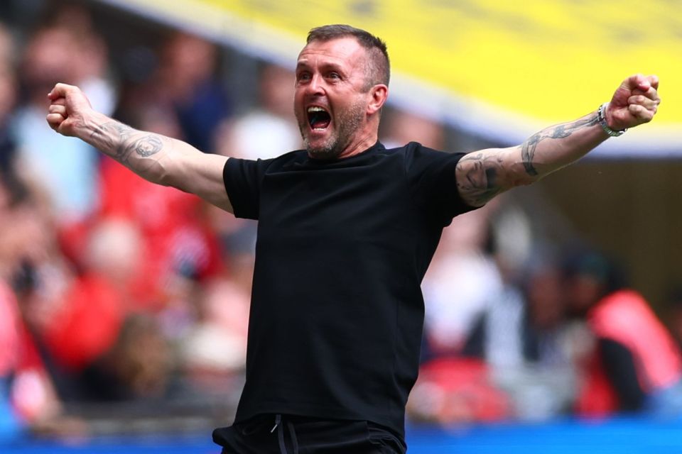 Charlton Athletic manager Nathan Jones celebrating.