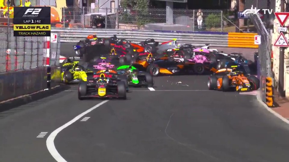 Eleven-car pile-up on a race track.