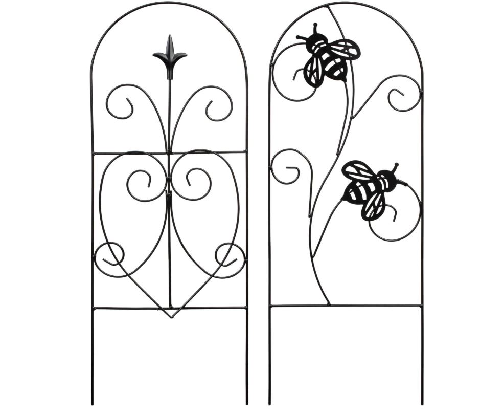 Two black metal garden trellises; one with a fleur-de-lis design, the other with bees.