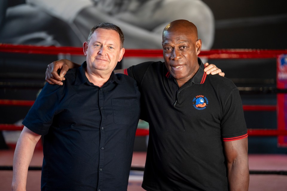Frank Bruno and Mike Hamilton in a boxing gym.