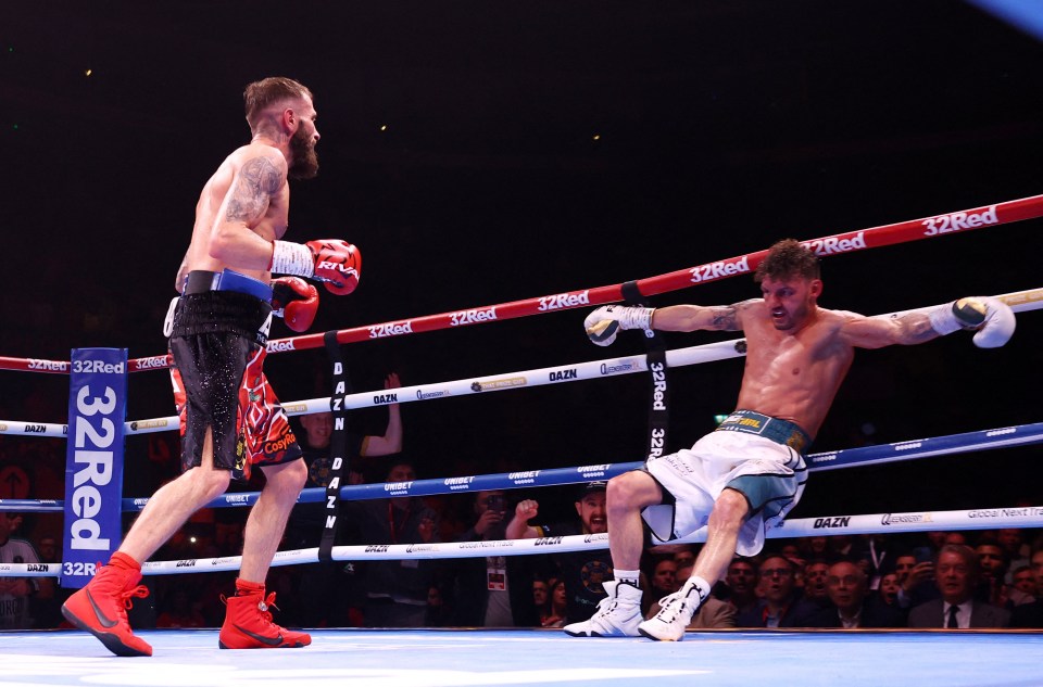 Boxer Leigh Wood is knocked down in a boxing match.