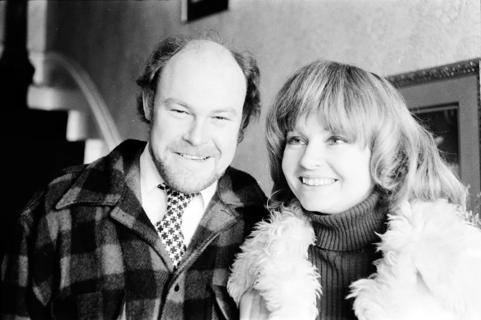 Black and white photo of a man and a woman.