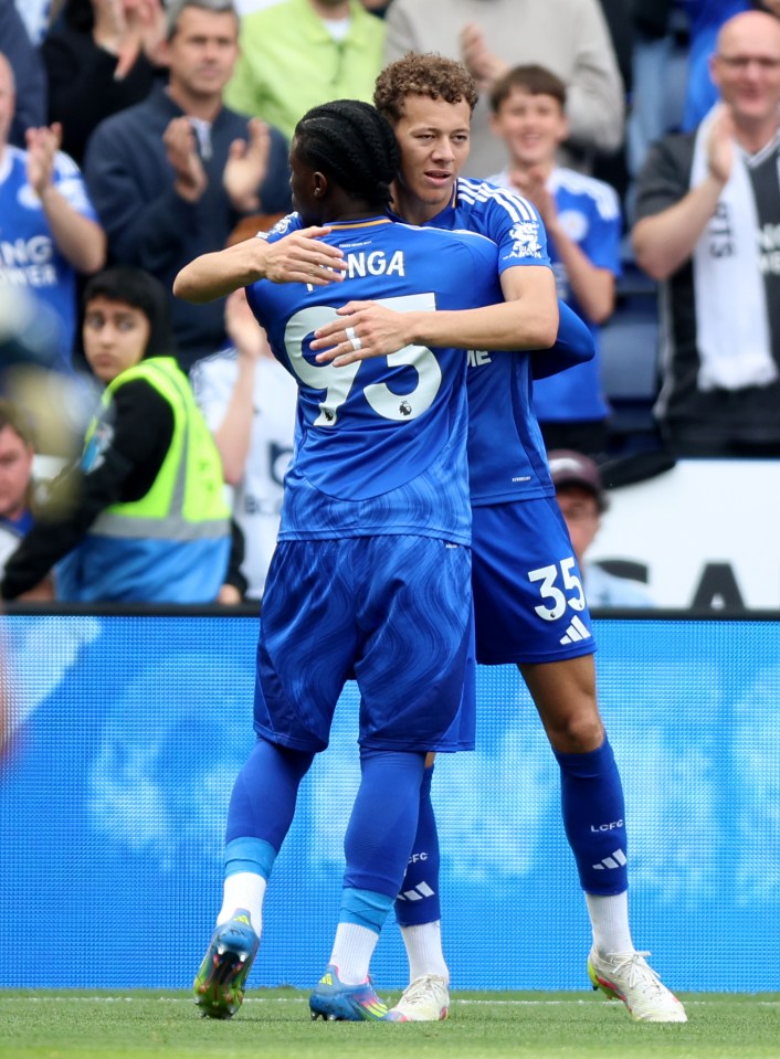 Leicester City players celebrating a goal.
