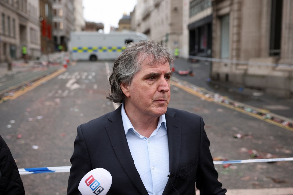 Liverpool Metro Mayor Steve Rotheram speaks to reporters at the scene of an incident where a car hit a crowd of Liverpool fans.